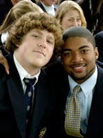 Two students smile for the camera on Headmaster's Day, 2008.